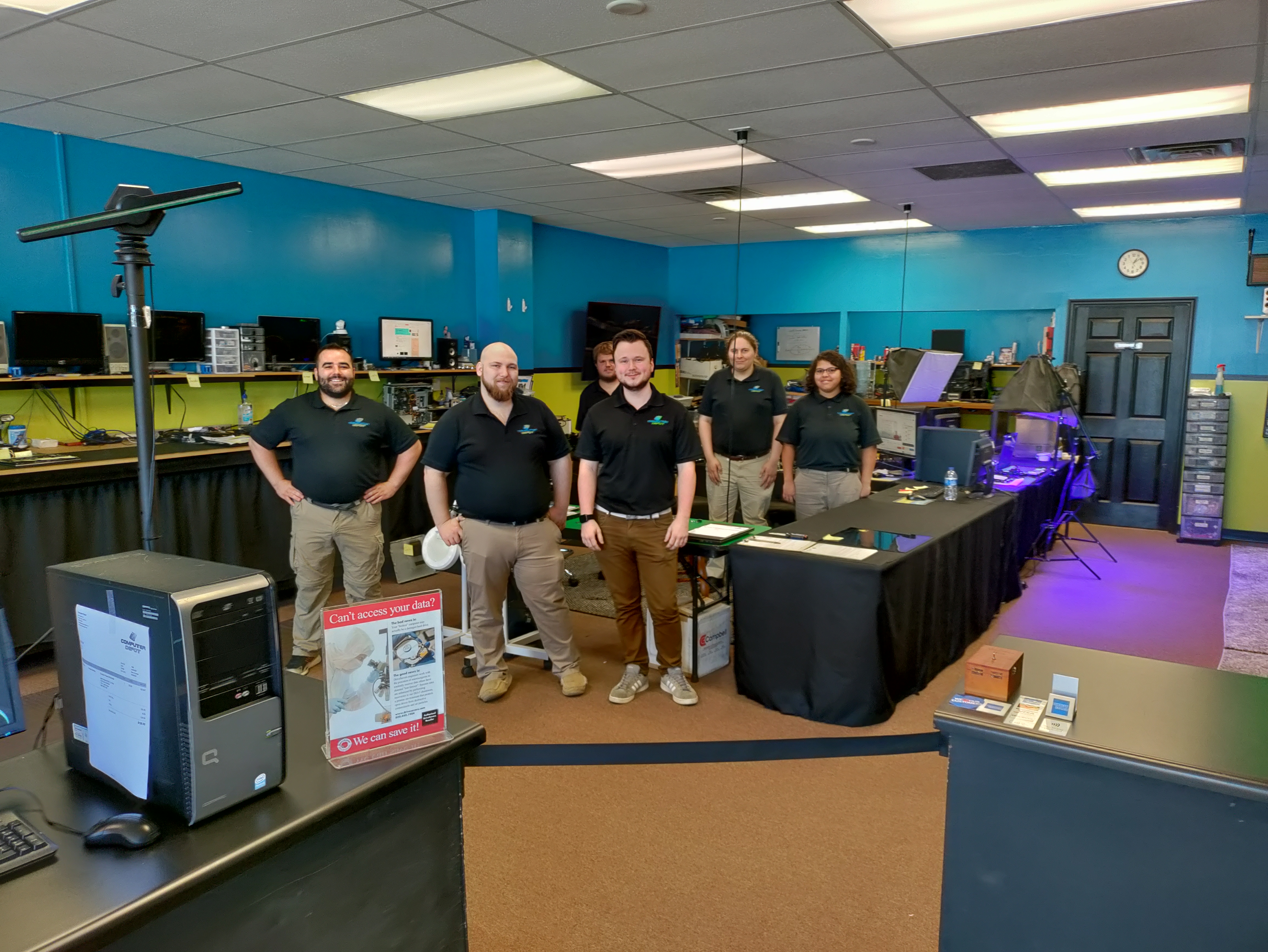 Computer Depot team together in the workshop